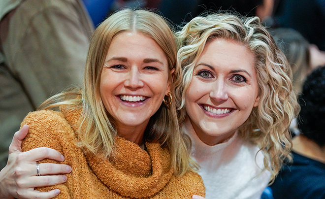 two women smiling
