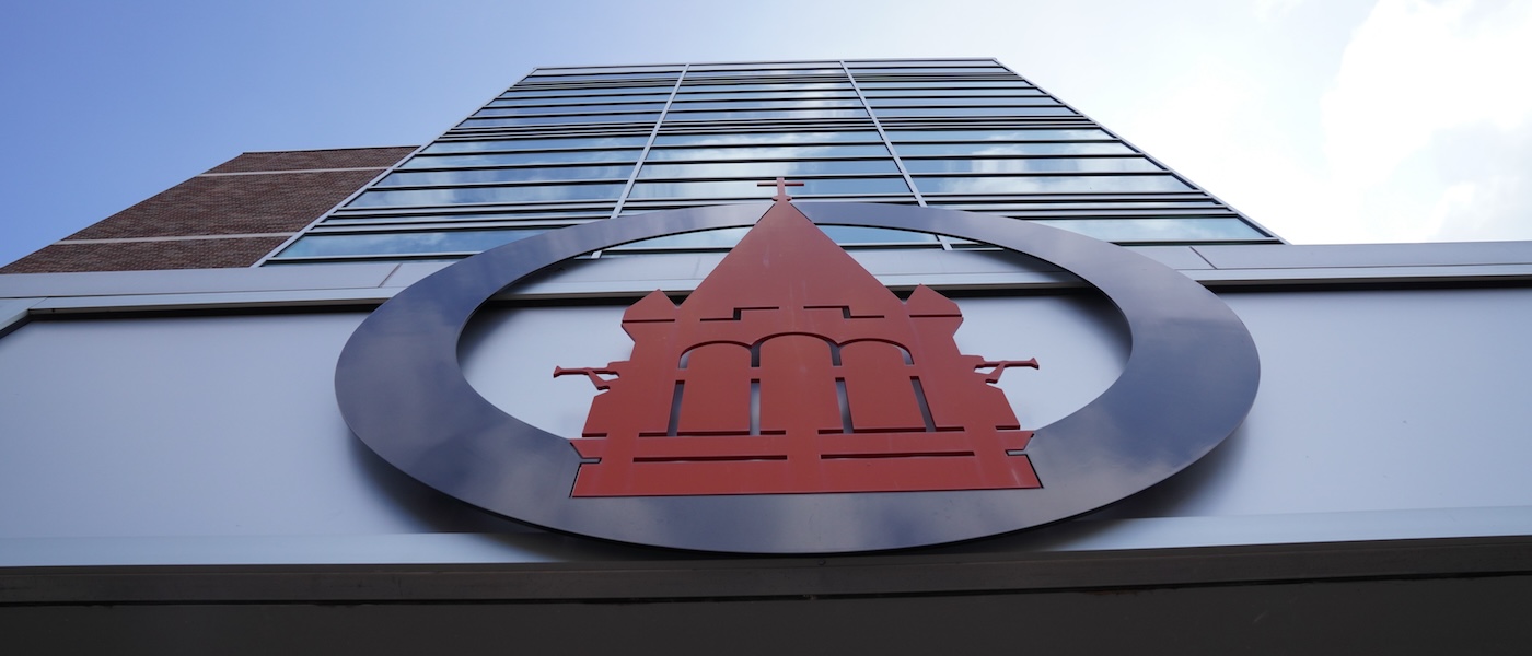 Glass building with UIW logo.