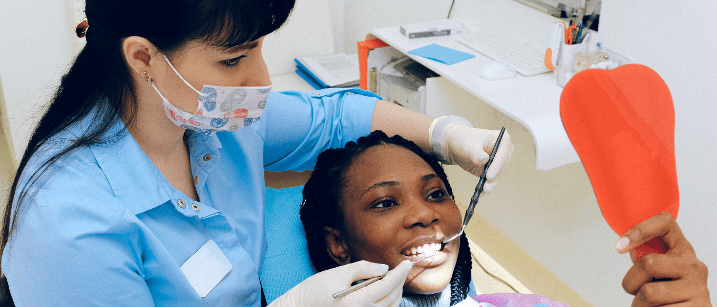dental assistant with a patient